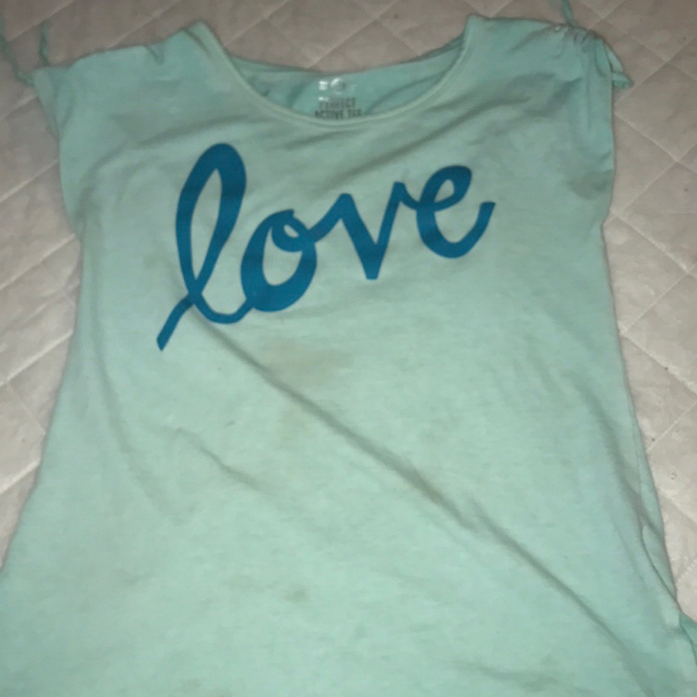 light blue/green "love" shirt